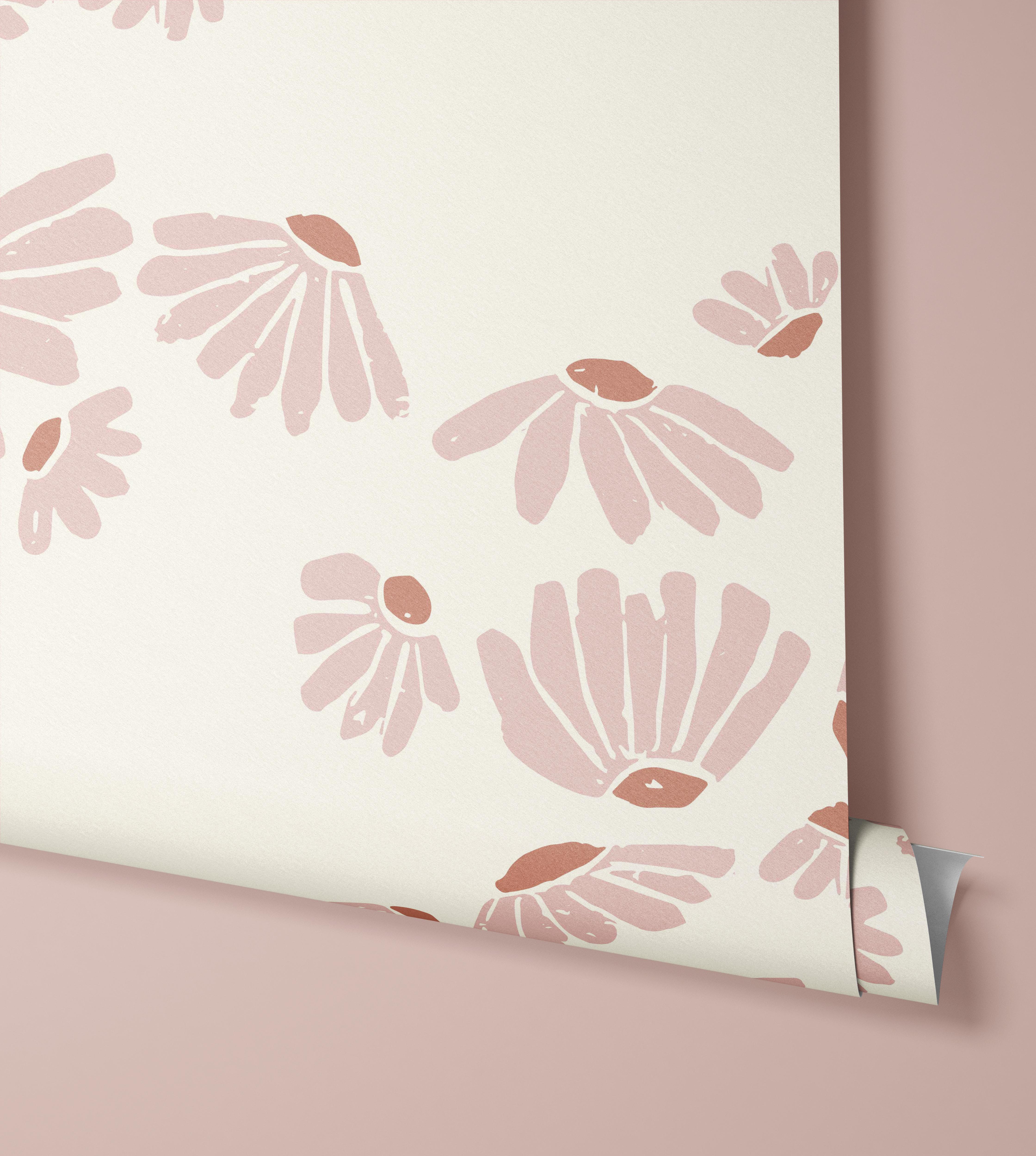 Wallpaper pf baby pink flowers floating on a cream background.